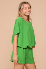 SHORT SLEEVE ROUND NECK TOP WITH TWIST FRONT HEM