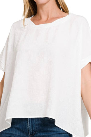 SHORT SLEEVE FLOWY TOP WITH TWIST HEM DETAIL