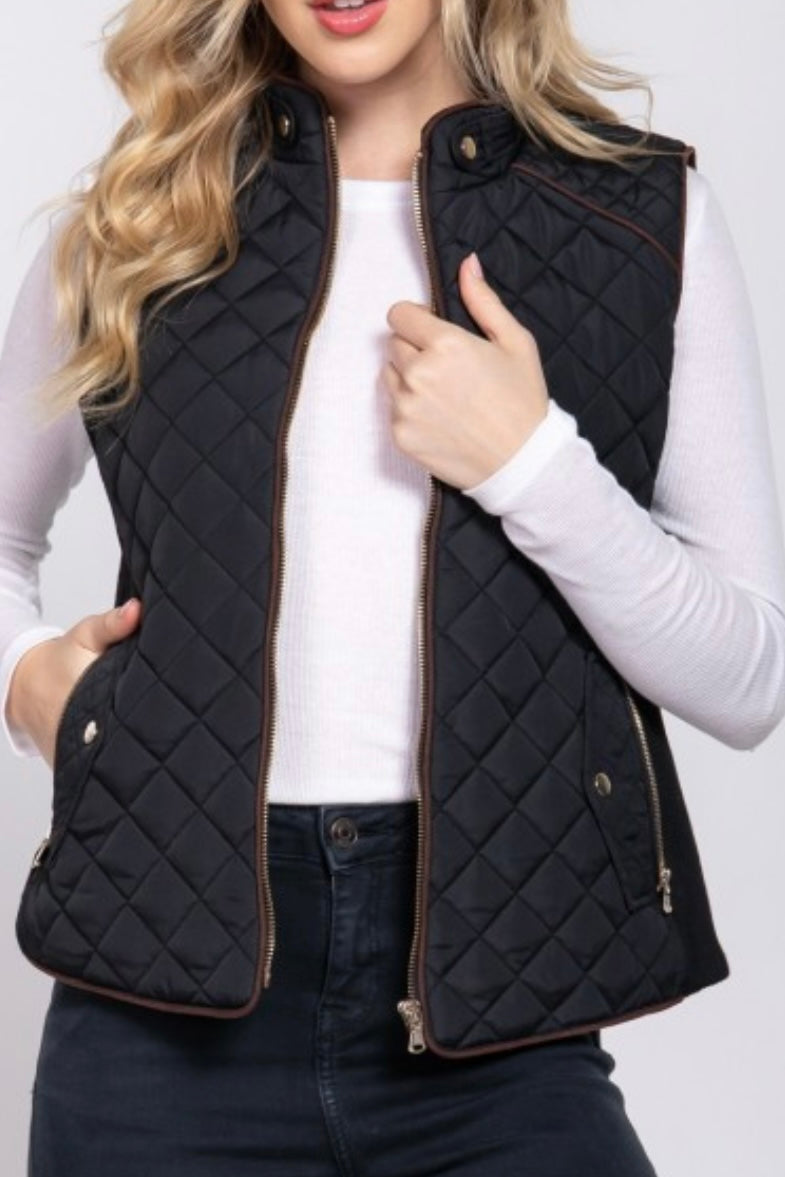 QUILTED VEST WITH SUEDE PIPING DETAIL