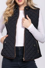 QUILTED VEST WITH SUEDE PIPING DETAIL