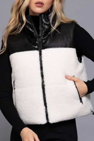 REVERSIBLE VEGAN LEATHER AND SHERPA VEST