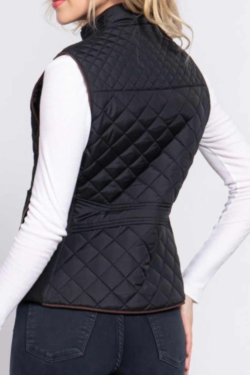 QUILTED VEST WITH SUEDE PIPING DETAIL