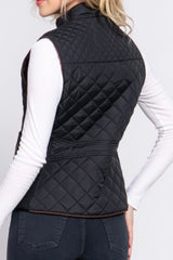 QUILTED VEST WITH SUEDE PIPING DETAIL