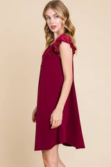 FLUTTER SLEEVE DRESS WITH VELVET DETAIL