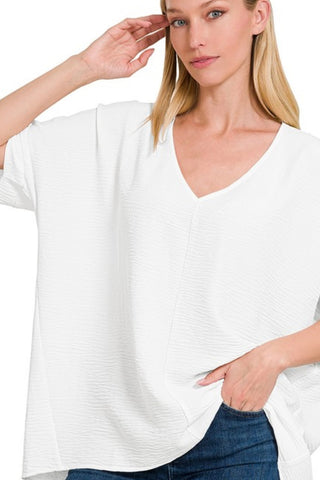 SHORT DOLMAN SLEEVE VNECK WOVEN TOP WITH CENTER SEAM
