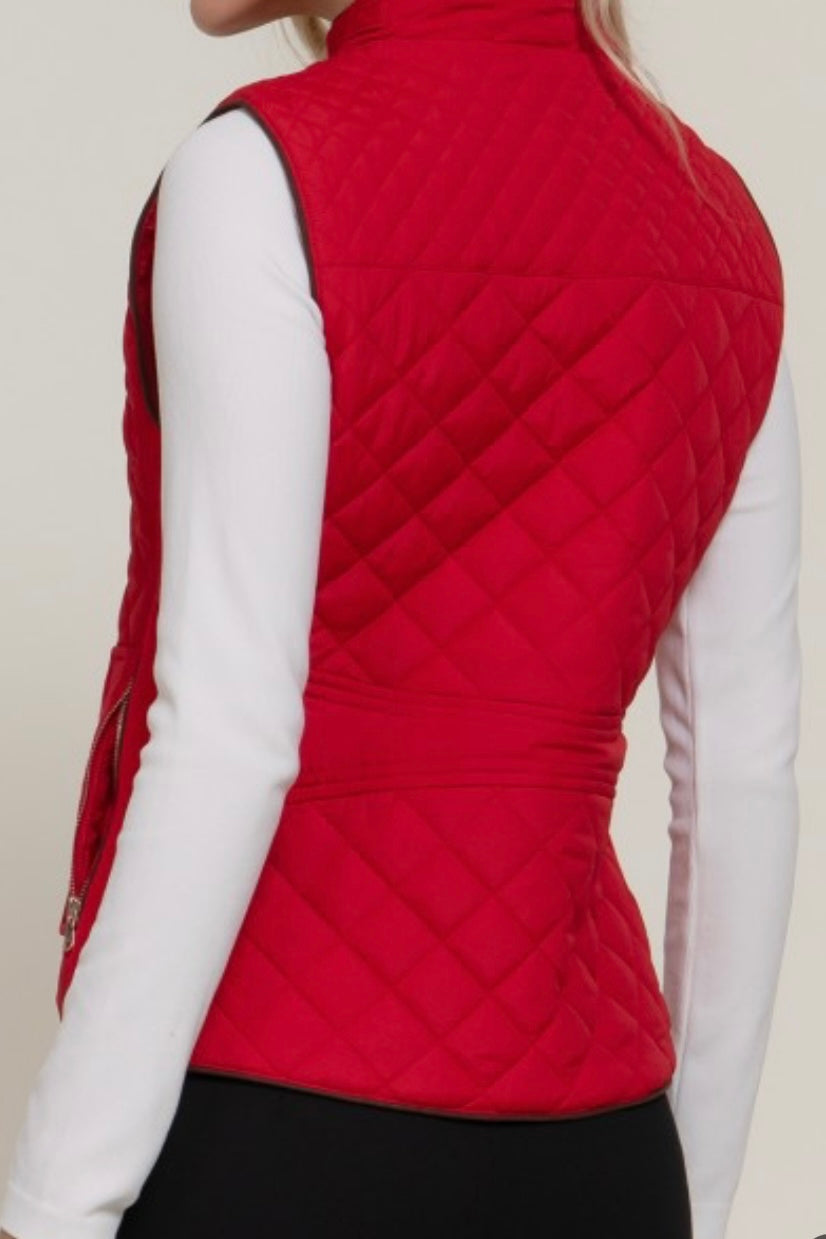 QUILTED VEST WITH SUEDE PIPING DETAIL