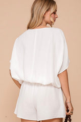 SHORT SLEEVE ROUND NECK TOP WITH TWIST FRONT HEM