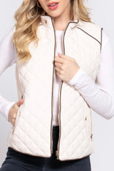 QUILTED VEST WITH SUEDE PIPING DETAIL
