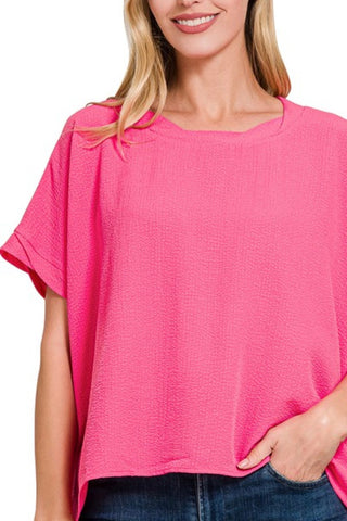 SHORT SLEEVE FLOWY TOP WITH TWIST HEM DETAIL