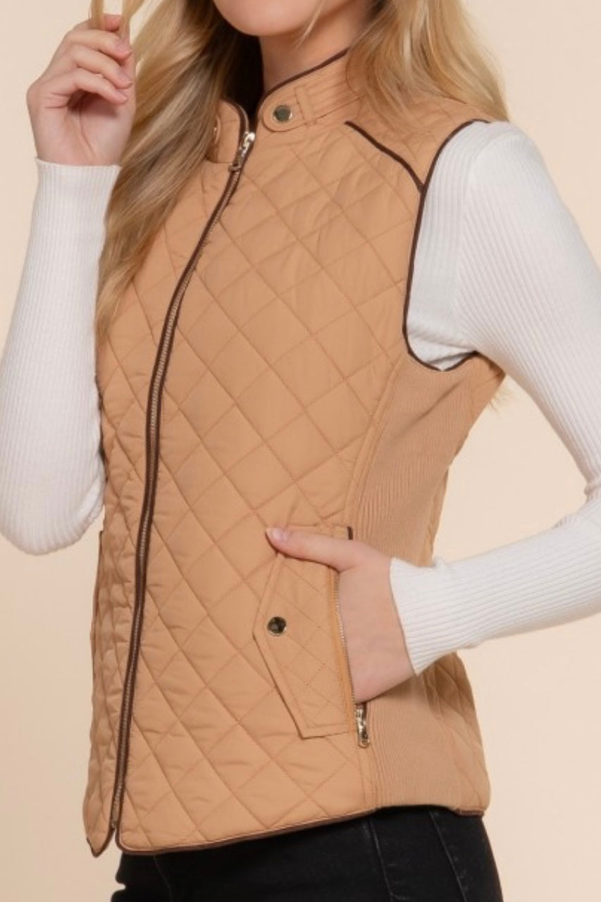 QUILTED VEST WITH SUEDE PIPING DETAIL