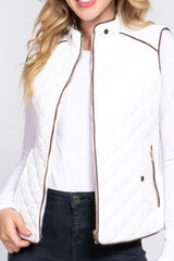 QUILTED VEST WITH SUEDE PIPING DETAIL