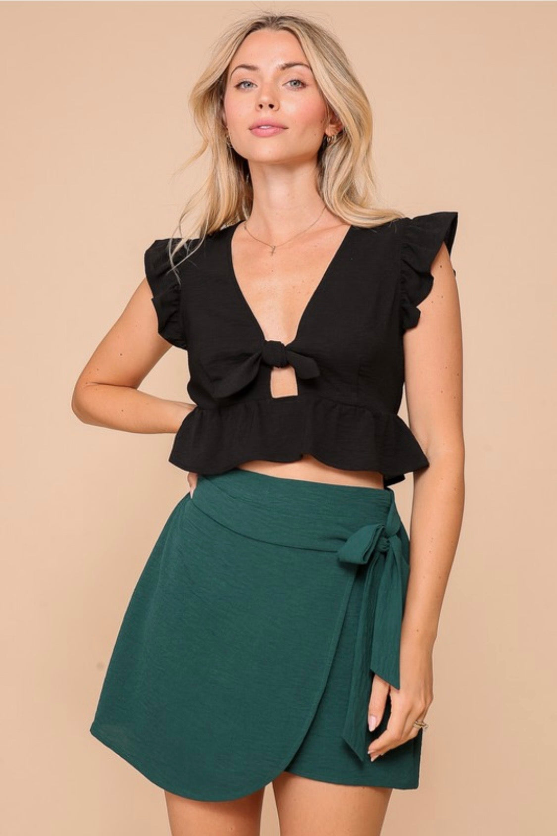 SHORT RUFFLE SLEEVE DEEP V TOP WITH PEEKABOO DETAIL