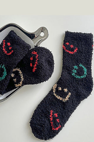 FUZZY SOCKS WITH EMBROIDERED SMILEY FACE