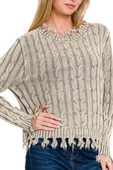 LONG SLEEVE MINERAL WASHED CABLE KNIT SWEATER WITH DISTRESSED HEM DETAIL