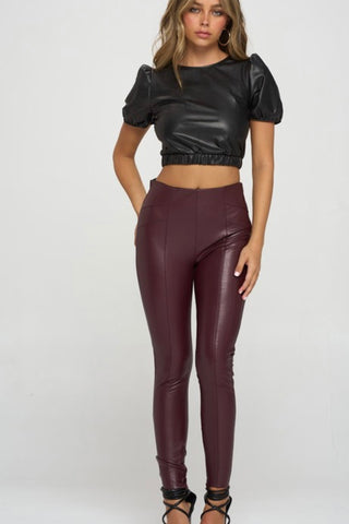 SHORT PUFF SLEEVE VEGAN LEATHER TOP WITH CRISS CROSS BACK DETAIL
