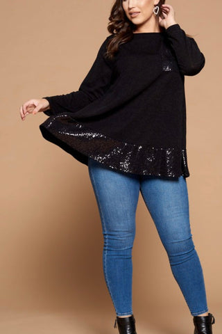 CURVY LONG SLEEVE SWEATER WITH SEQUIN POCKET AND RUFFLE HEM